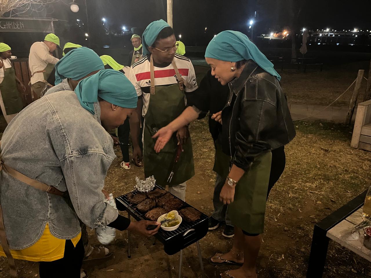 Cocktail station stocked with spirits, juices and fresh fruit